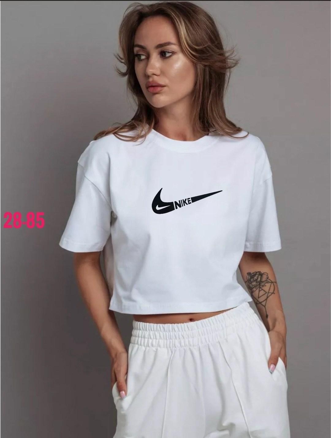 футболка найк женская укороченная,женская спортивная одежда nike,женские укороченные футболки nike,футболка женская nike,укороченная футболка