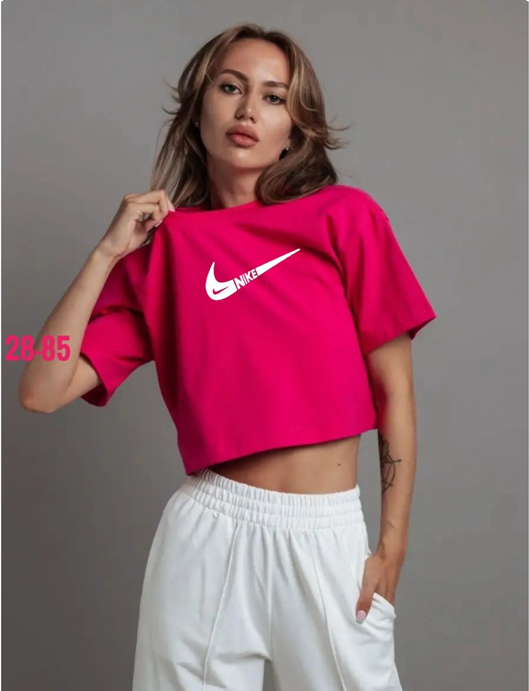 футболка найк женская укороченная,женская спортивная одежда nike,женские укороченные футболки nike,футболка женская nike,укороченная футболка