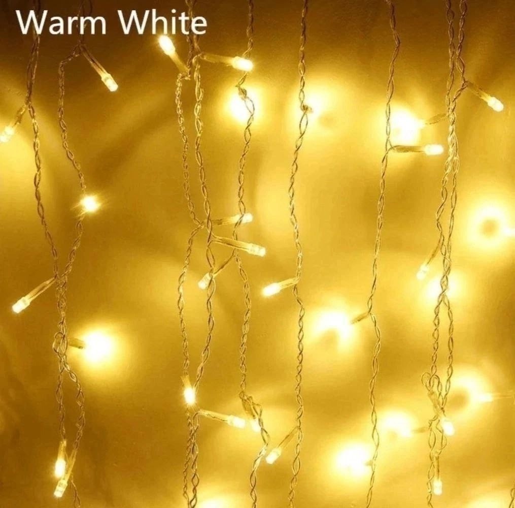 новогоднее украшение дома снаружи,украшение дома к новому году снаружи,новогоднее украшение дома,украшение домов гирляндами,led christmas icicle lights