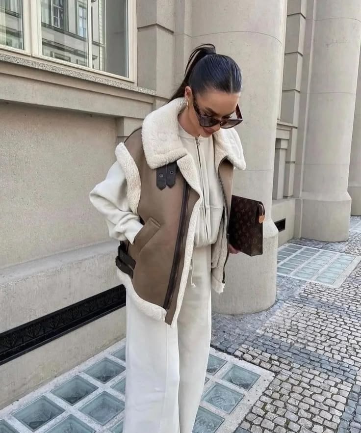 жилетка дубленка,стильная жилетка,жилетка женская,меховая жилет,жилет женский