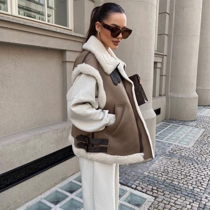 жилетка дубленка,стильная жилетка,жилетка женская,меховая жилет,жилет женский