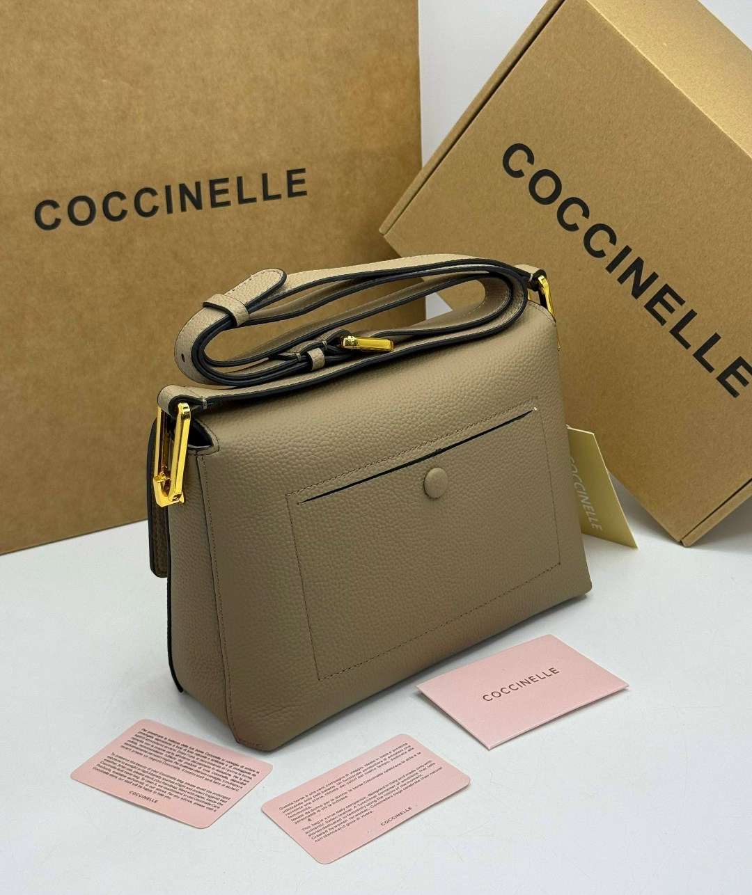 сумка coccinelle,женская сумка coccinelle,бежевая сумка,кожаная сумка coccinelle,сумки женская