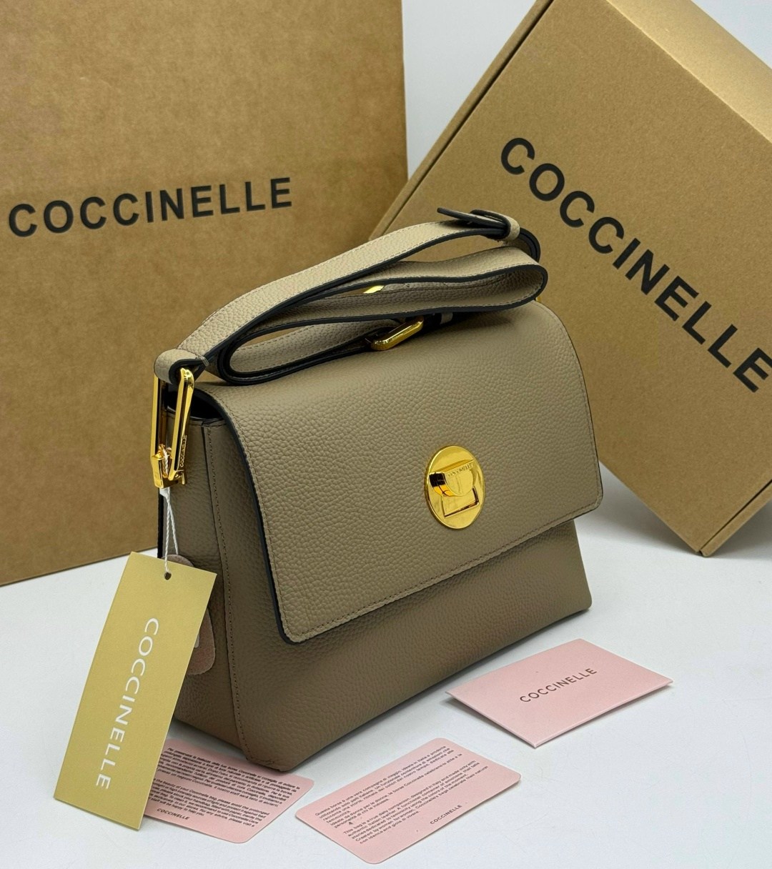 сумка coccinelle,женская сумка coccinelle,бежевая сумка,кожаная сумка coccinelle,сумки женская