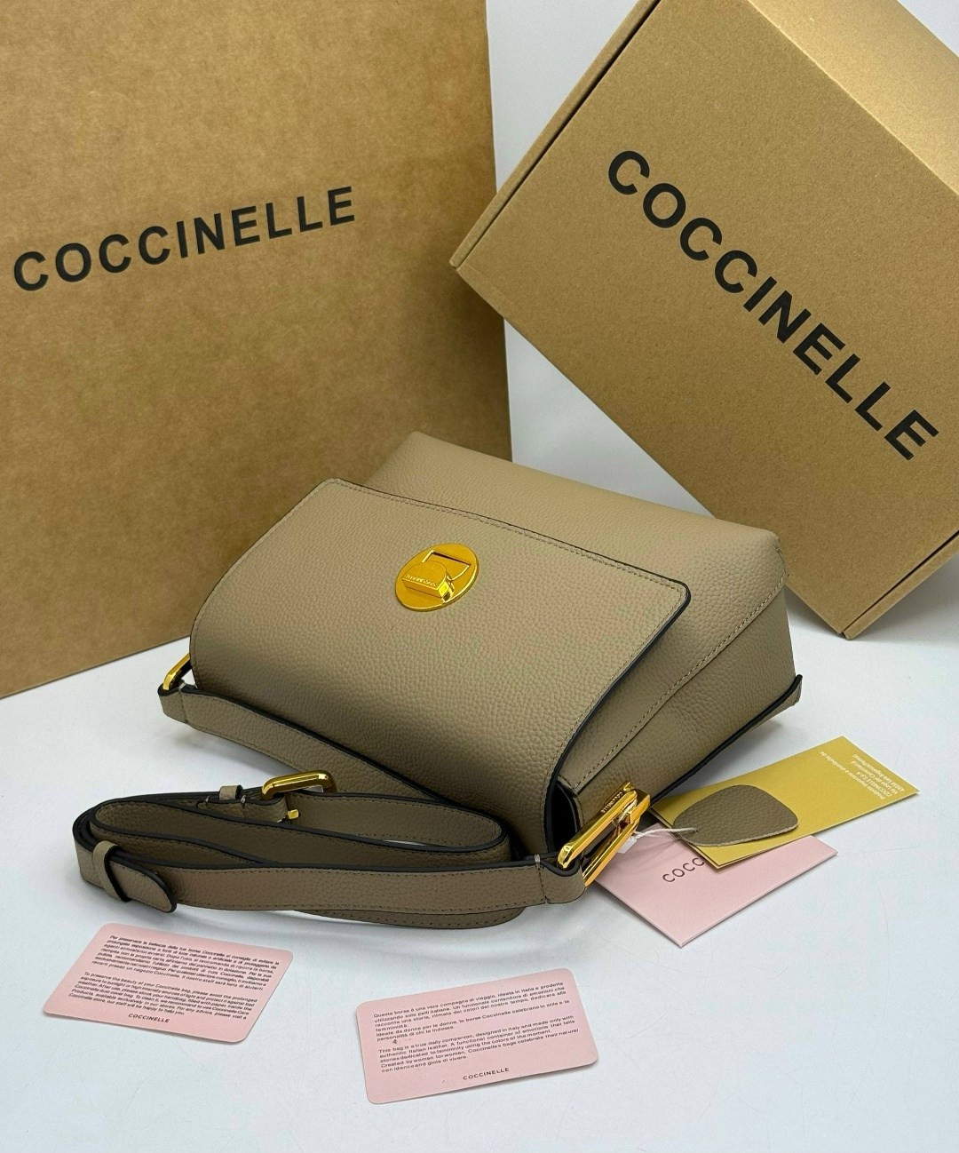 сумка coccinelle,женская сумка coccinelle,бежевая сумка,кожаная сумка coccinelle,сумки женская