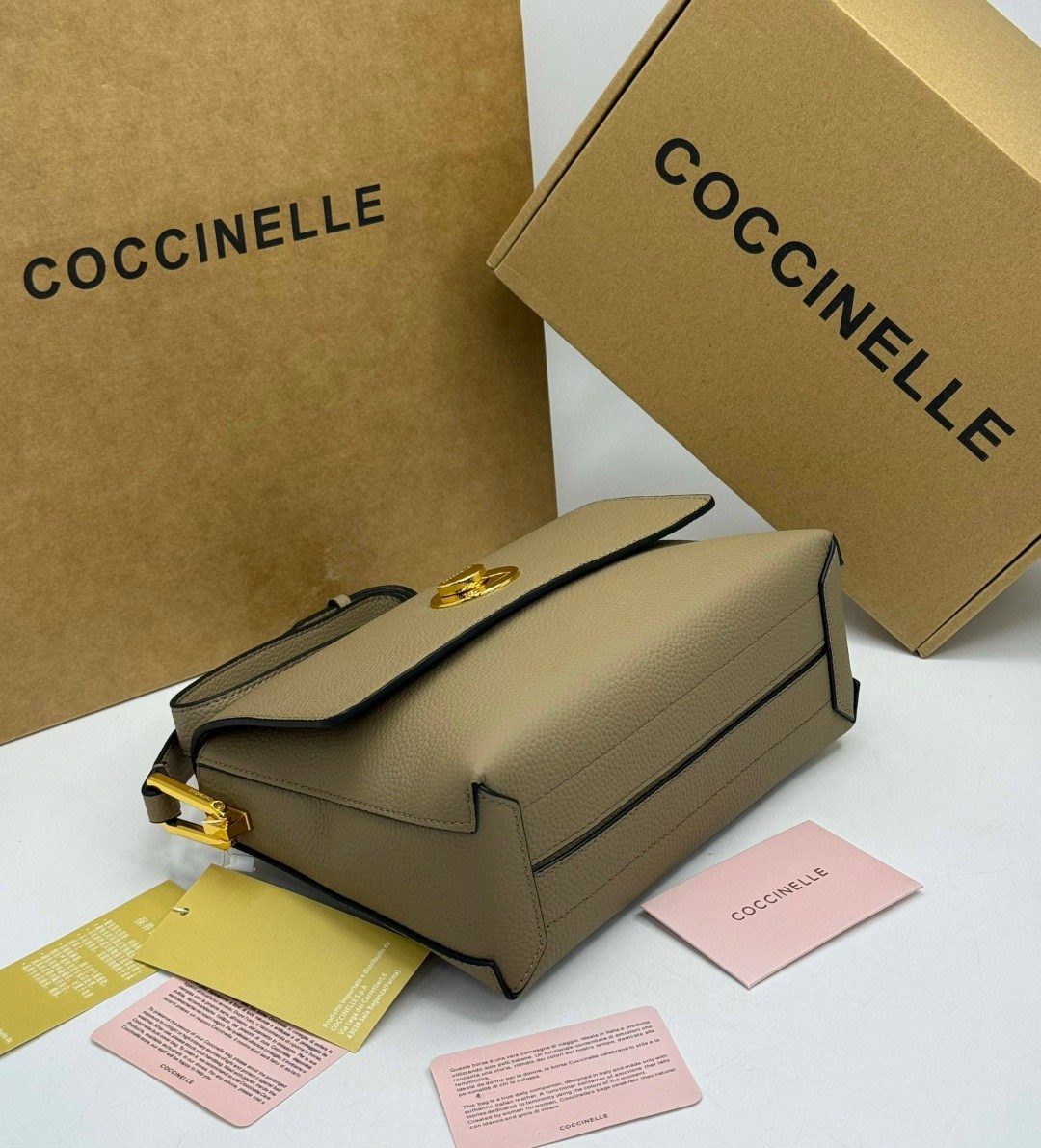 сумка coccinelle,женская сумка coccinelle,бежевая сумка,кожаная сумка coccinelle,сумки женская