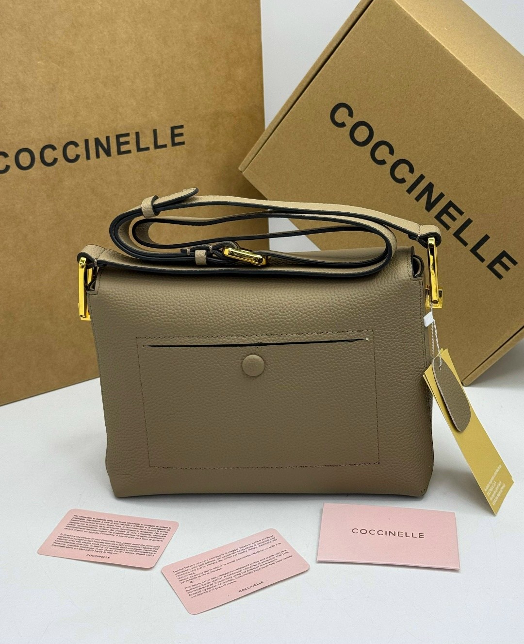 сумка coccinelle,женская сумка coccinelle,бежевая сумка,кожаная сумка coccinelle,сумки женская