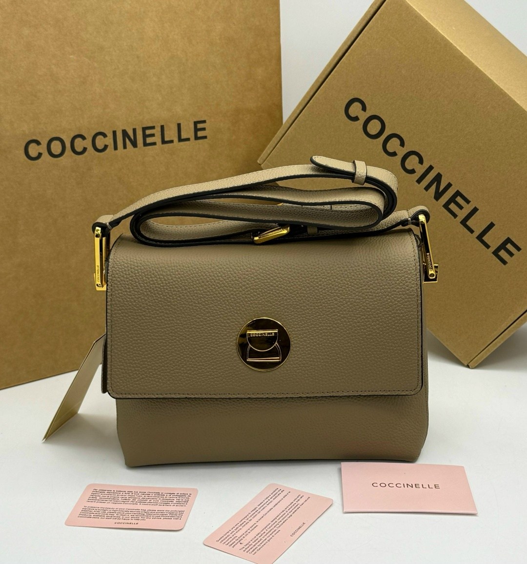 сумка coccinelle,женская сумка coccinelle,бежевая сумка,кожаная сумка coccinelle,сумки женская