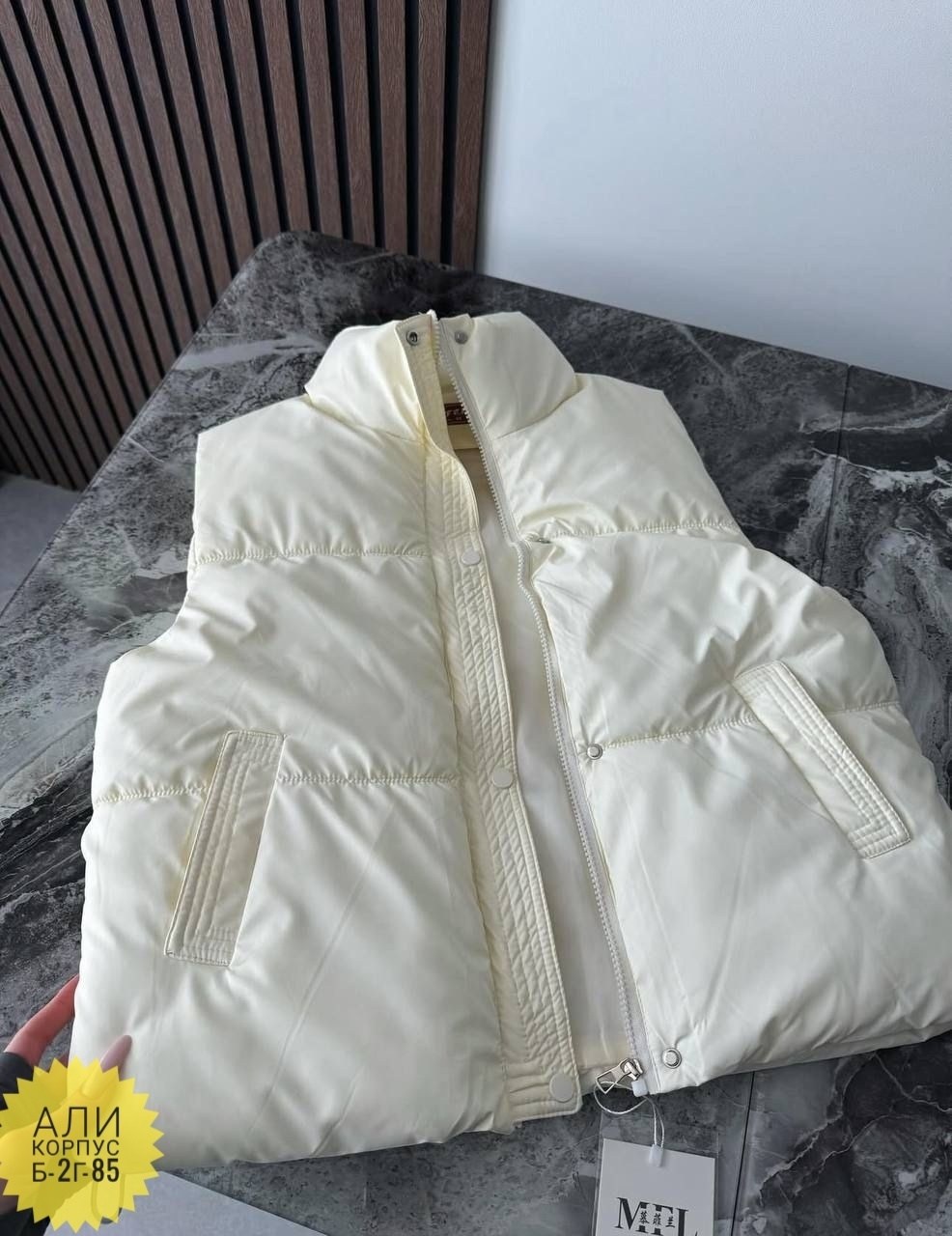 пуховый жилет,теплый жилет,жилетка теплая,демисезонная жилетка,пуховой жилет