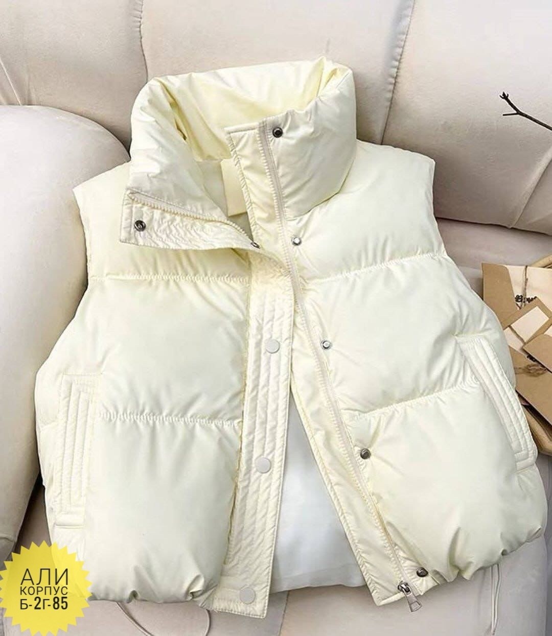пуховый жилет,теплый жилет,жилетка теплая,демисезонная жилетка,пуховой жилет