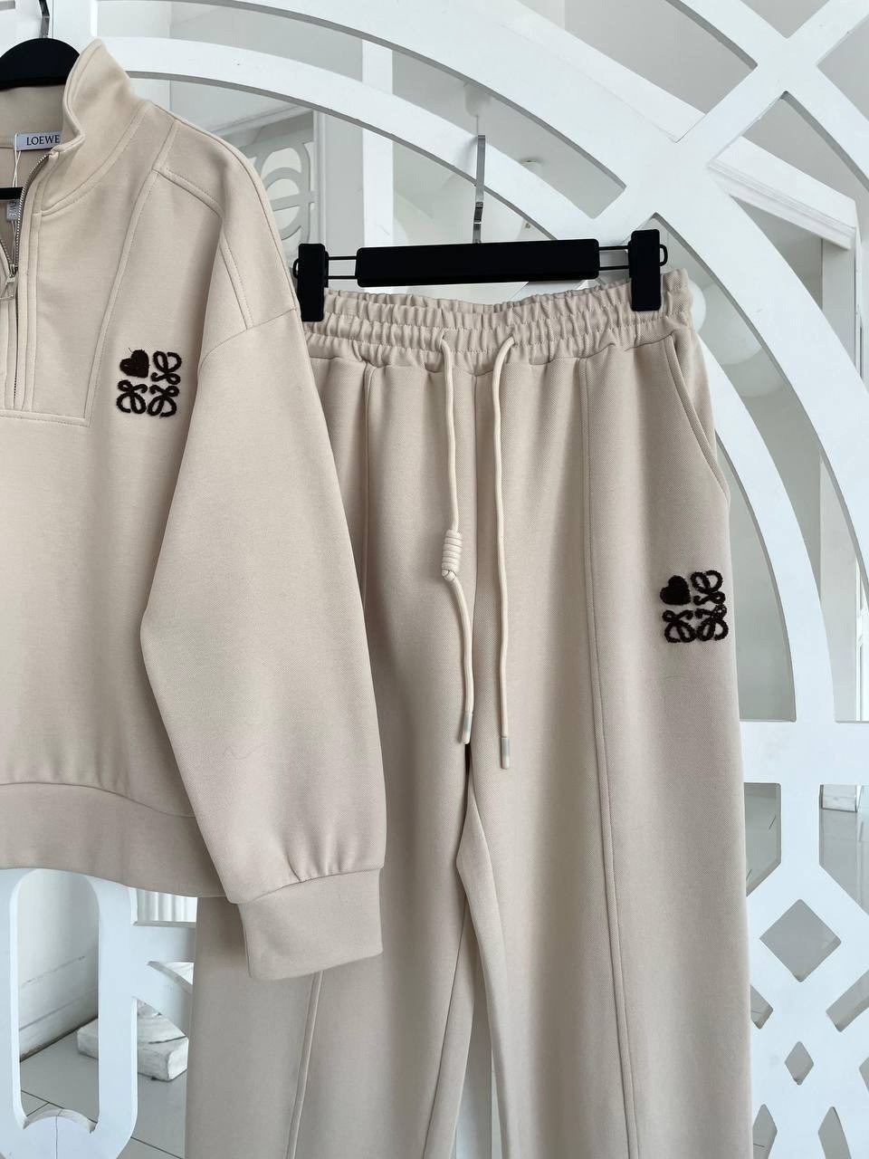 спортивные костюм,костюмы спортивные женские,трикотажные костюмы,стильные костюмы,костюмы комплекты