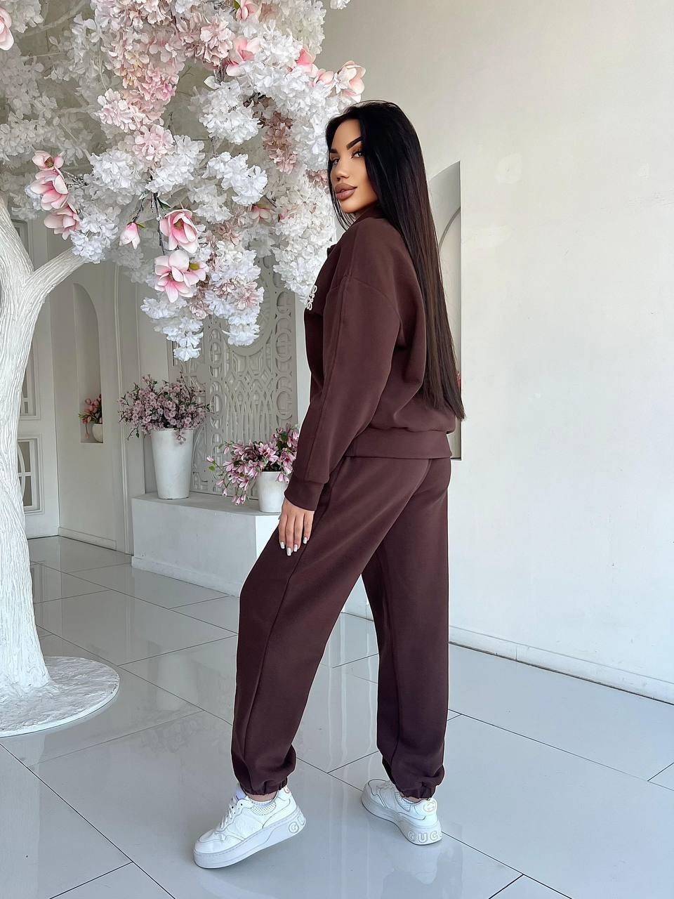 спортивные костюм,костюмы спортивные женские,трикотажные костюмы,стильные костюмы,костюмы комплекты