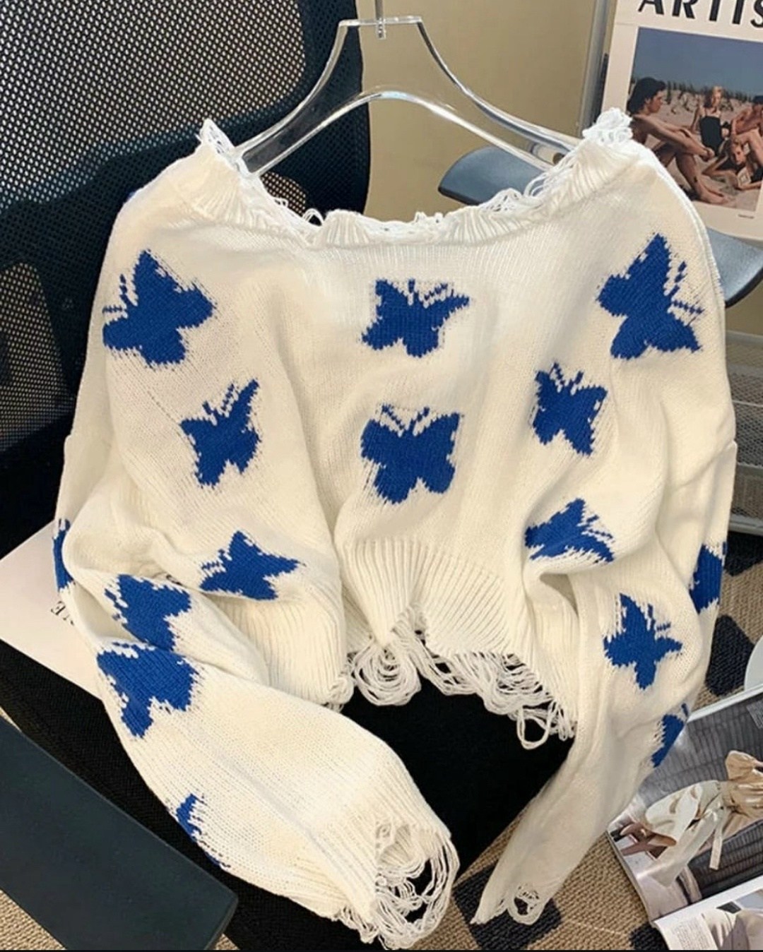 свитер с дырками,шикарные женские свитера zoki с дырками,свитер с бабочками,свитеры модные,вязаный свитер с принтом