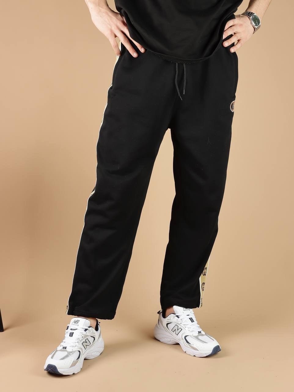 штаны гуччи мужские с полоской,спортивные штаны гуччи,штаны спортивные,спортивные женские штаны гуччи,спортивные штаны гуччи женские черные