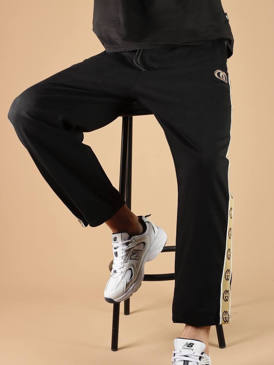 штаны гуччи мужские с полоской,спортивные штаны гуччи,штаны спортивные,спортивные женские штаны гуччи,спортивные штаны гуччи женские черные