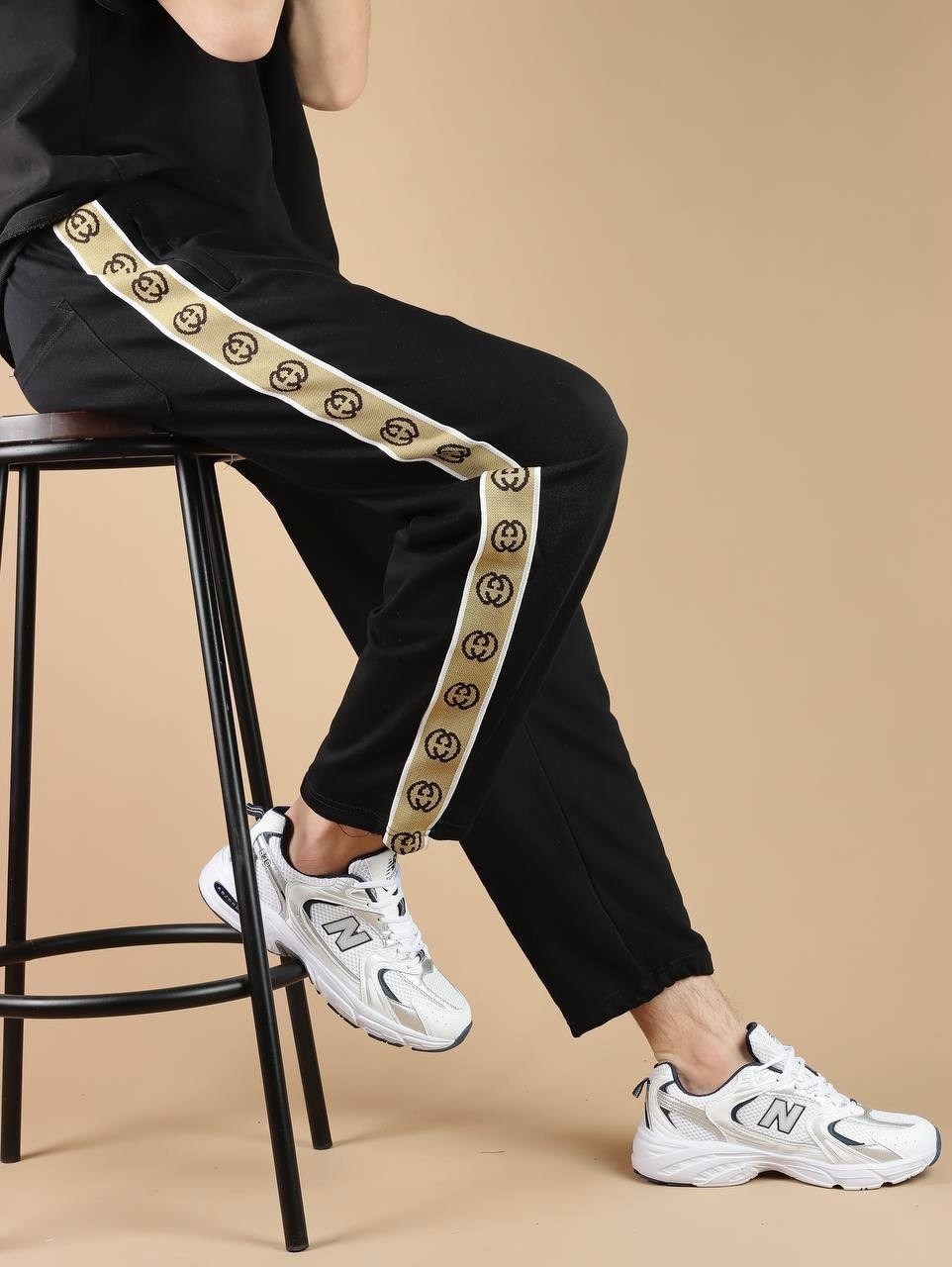 штаны гуччи мужские с полоской,спортивные штаны гуччи,штаны спортивные,спортивные женские штаны гуччи,спортивные штаны гуччи женские черные