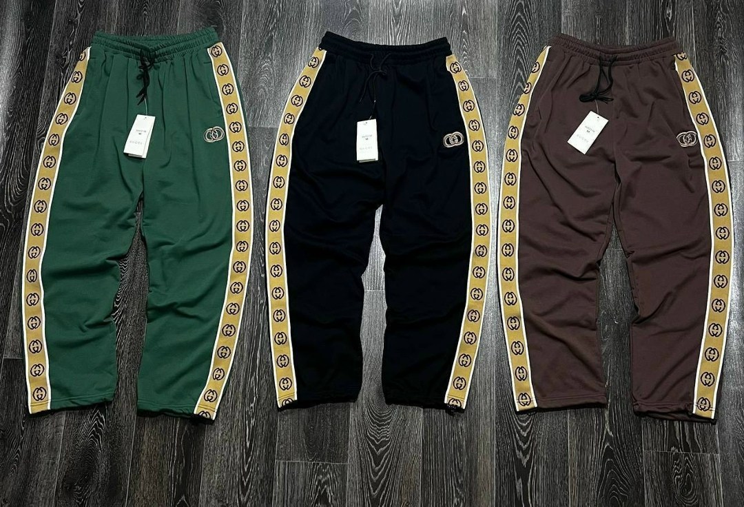 штаны гуччи мужские с полоской,спортивные штаны гуччи,штаны спортивные,спортивные женские штаны гуччи,спортивные штаны гуччи женские черные