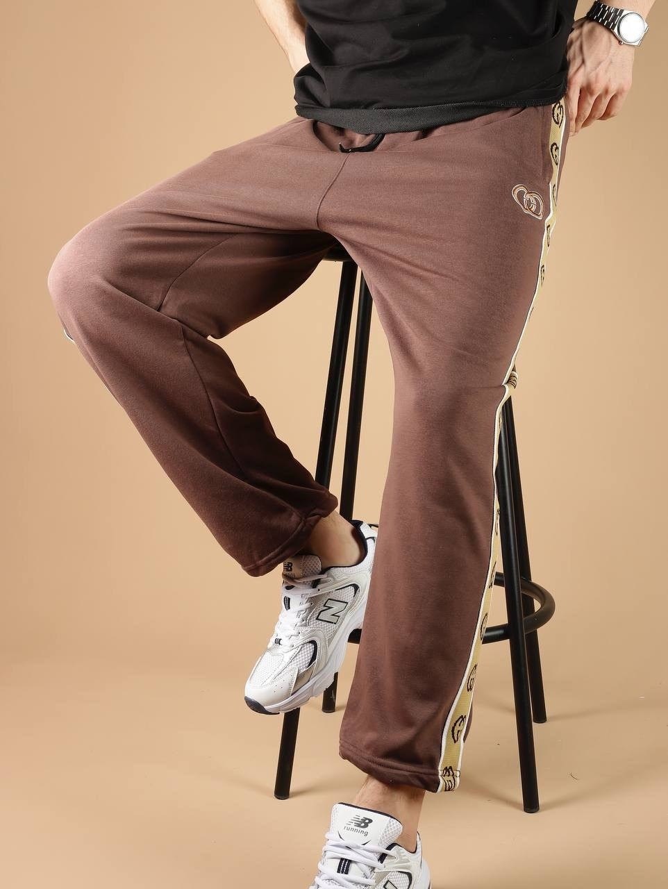 штаны гуччи мужские с полоской,спортивные штаны гуччи,штаны спортивные,спортивные женские штаны гуччи,спортивные штаны гуччи женские черные