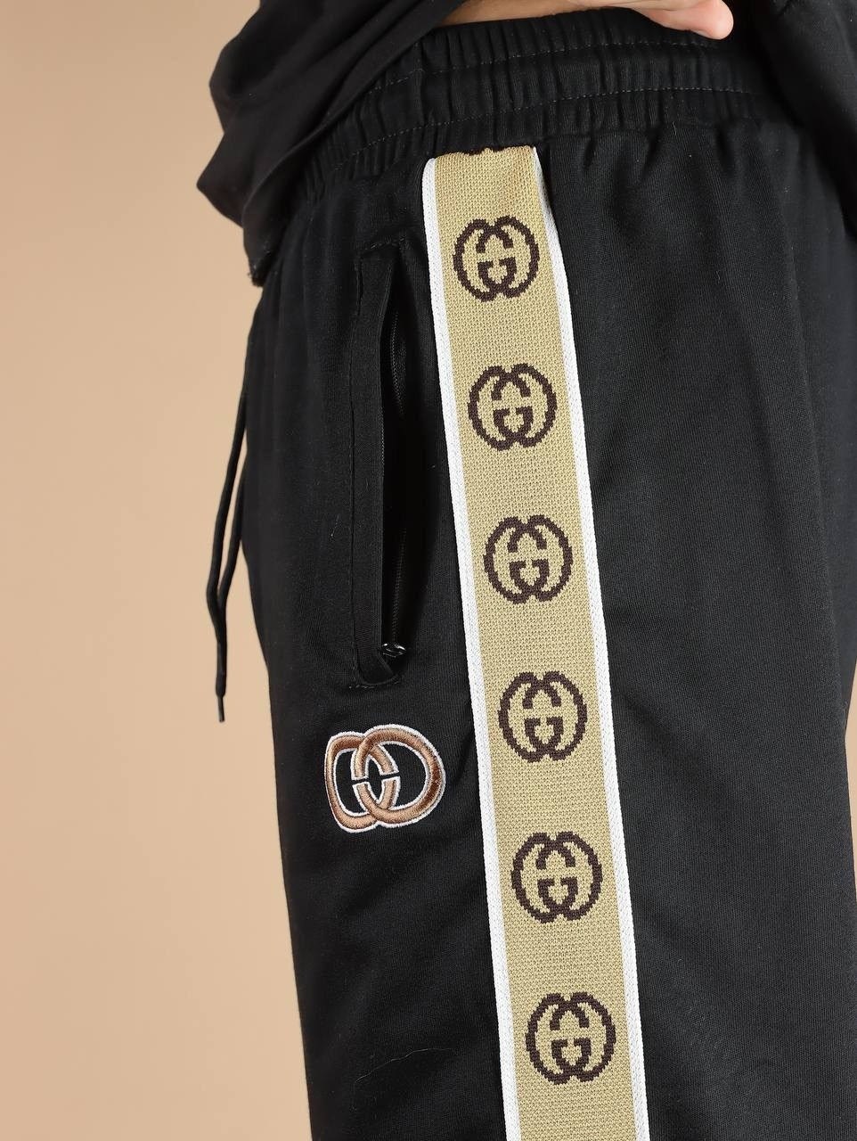 штаны гуччи мужские с полоской,спортивные штаны гуччи,штаны спортивные,спортивные женские штаны гуччи,спортивные штаны гуччи женские черные