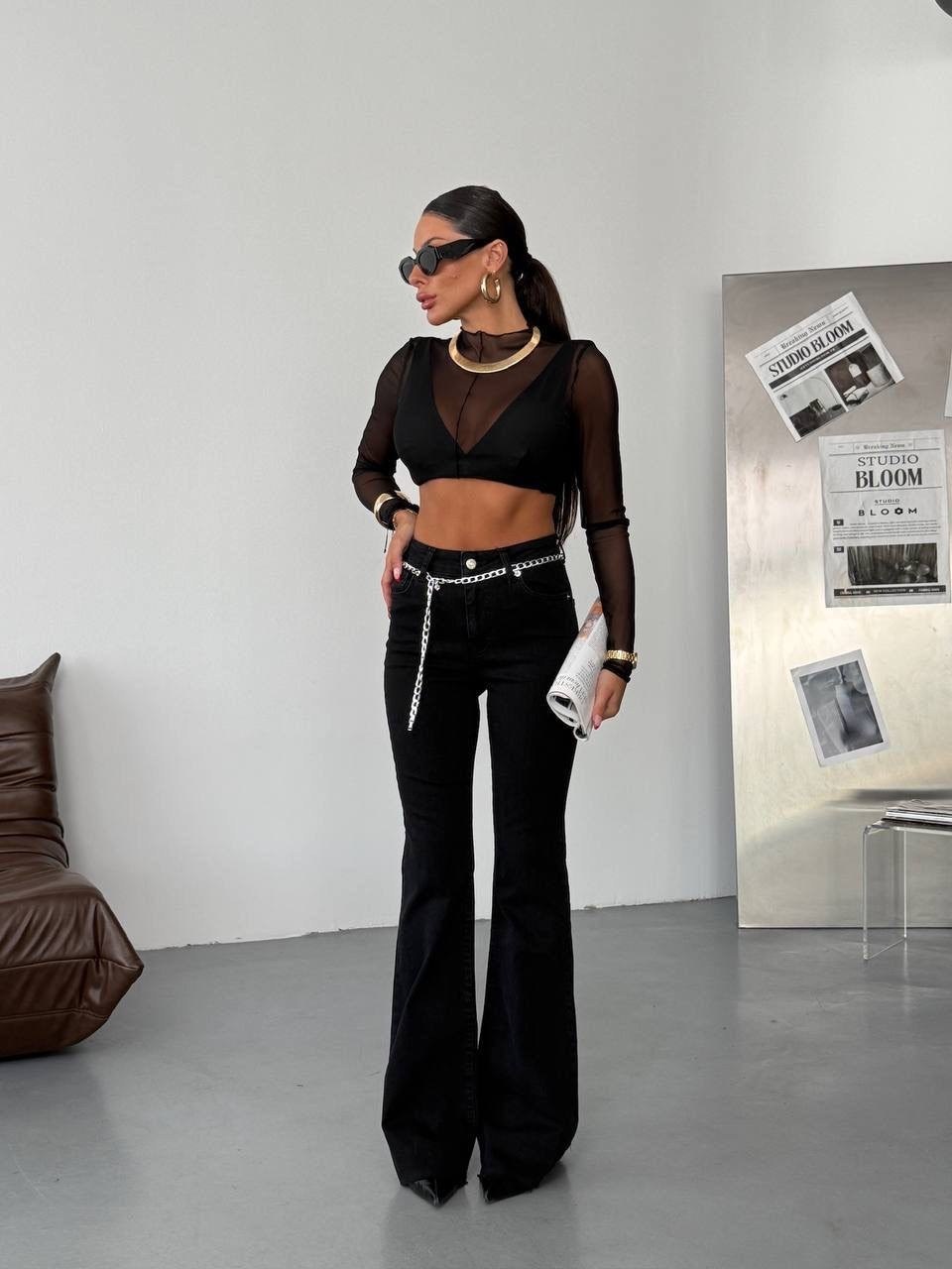 джинсы с разрезом,модные брюки,брюки клеш,черные брюки