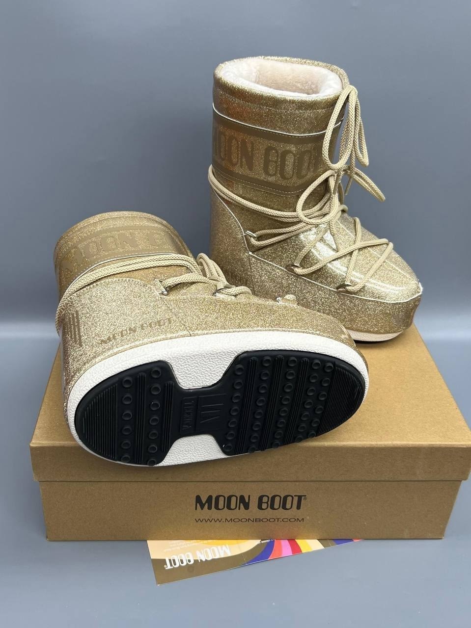 зимние ботинки icon low glitter с покрытием moon boot золотой,зимние ботинки icon с блестками moon boot золото,зимние ботинки icon glitter moon boot золото,детские зимние ботинки moon boot 14028500 mb