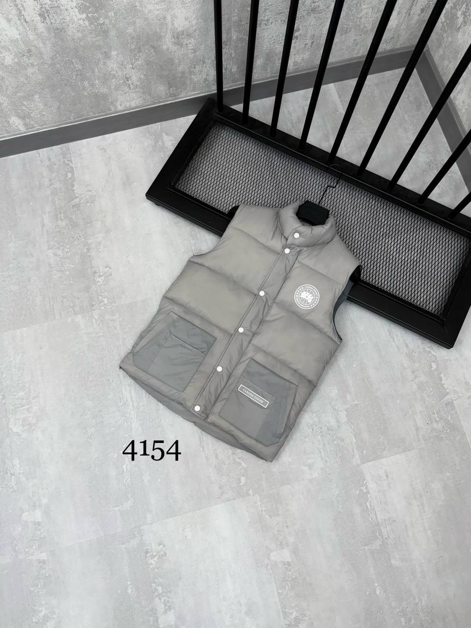 жилет мужской,жилет,пуховой жилет,жилет женский,жилетка мужская