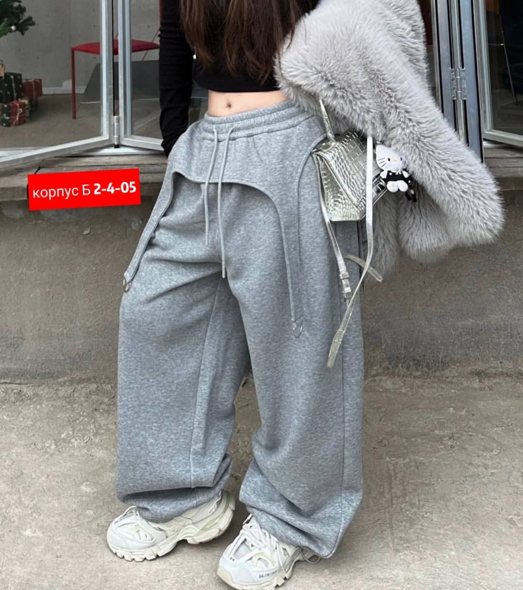 брюки модные,брюки с широкими штанинами,модные штаны,широкие штаны,брюки карго