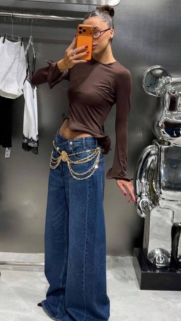 джинсы с цепочкой,широкие женские джинсы,джинсы модные,джинсы стильные,джинсы с цепью