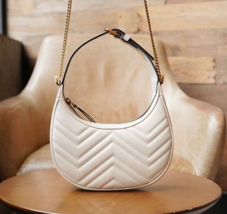 женская сумка gucci,сумка gucci,сумка гуччи белая маленькая,gucci сумка на плечо,кожаная сумка через плечо gg marmont mini gucci