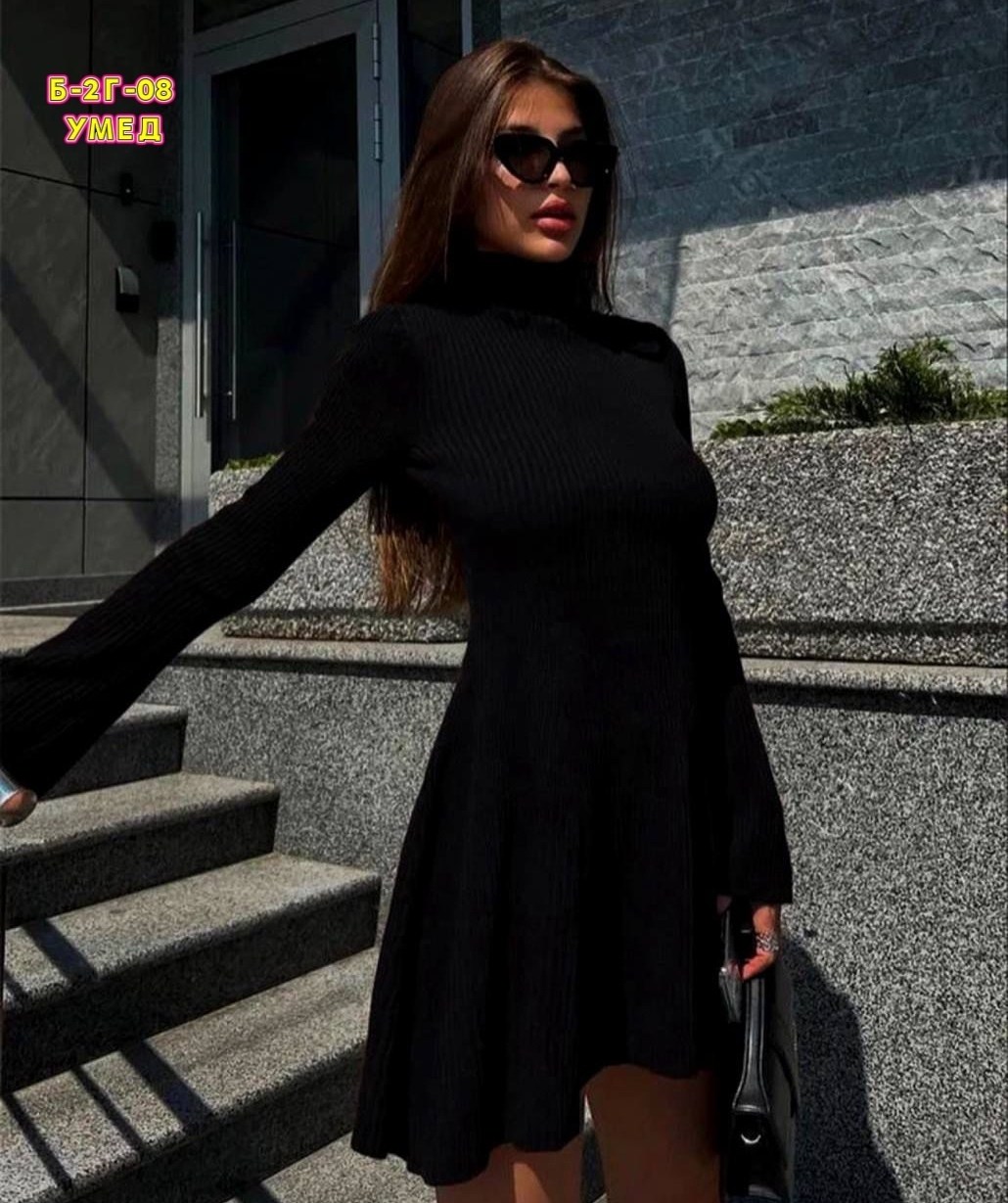 расклешенное черное платье с длинными рукавами,черное платье,стильное платье,короткое черное платье с длинным рукавом,трикотажное платье