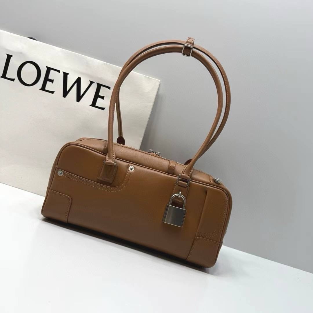 модная сумка,сумка loewe,бордовая сумка loewe,дорожная сумка,сумка женская