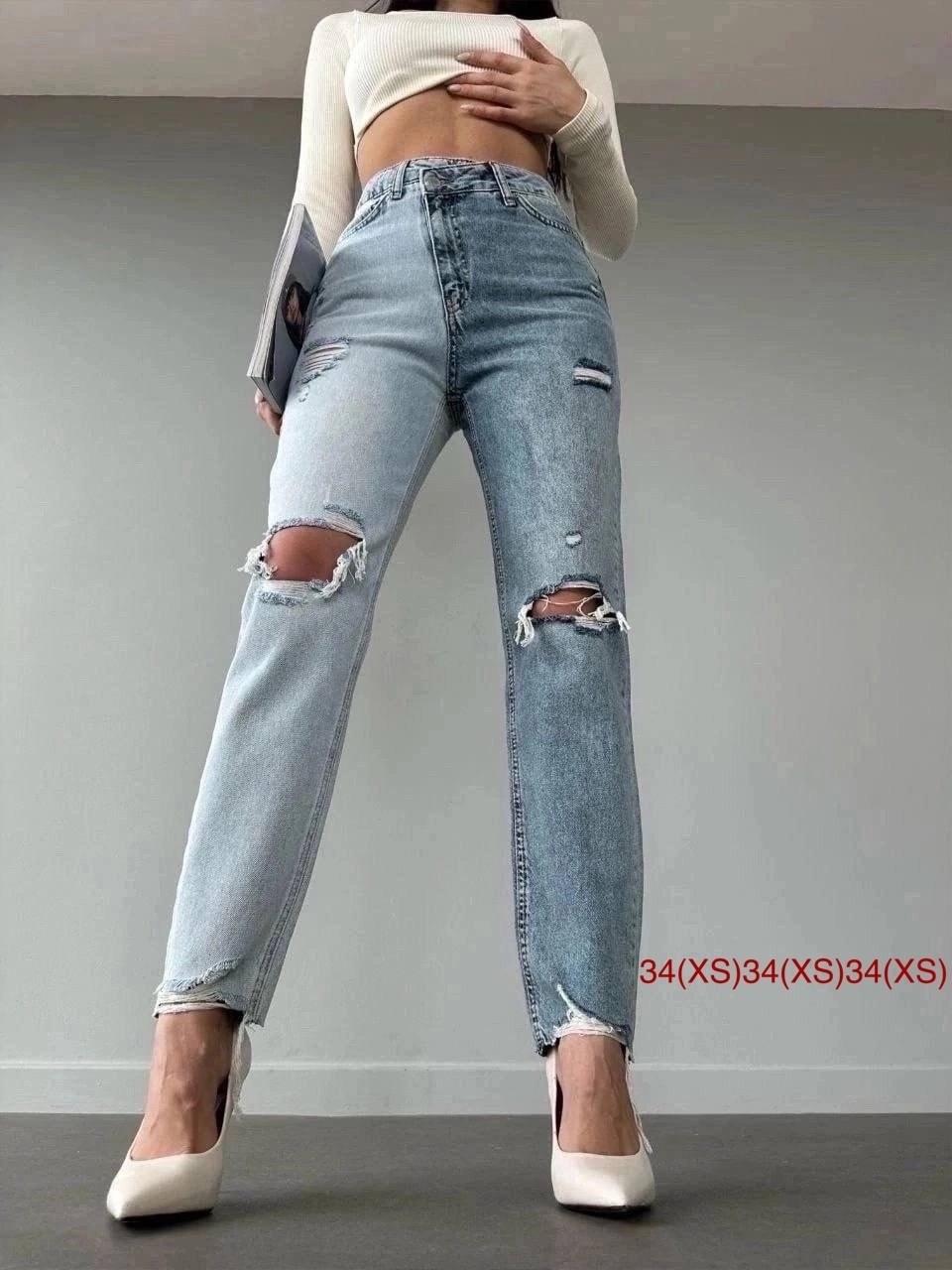 девушка джинсах,широкие рваные джинсы,джинсы мом рваные,джинсах,джинсы модные