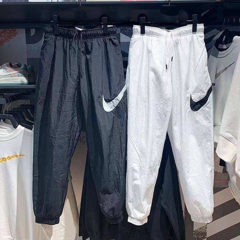 плащевые штаны big swoosh летние найк джоггеры nike,плащевые штаны big swoosh летние найк джоггеры nike 396985725,спортивные штаны nike плащевые,спортивные штаны ретро плащевка nike цвет черный,спорти
