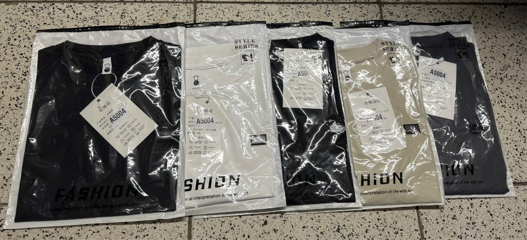 упаковка партии одежды,одежд,футболка,брендовые одежды