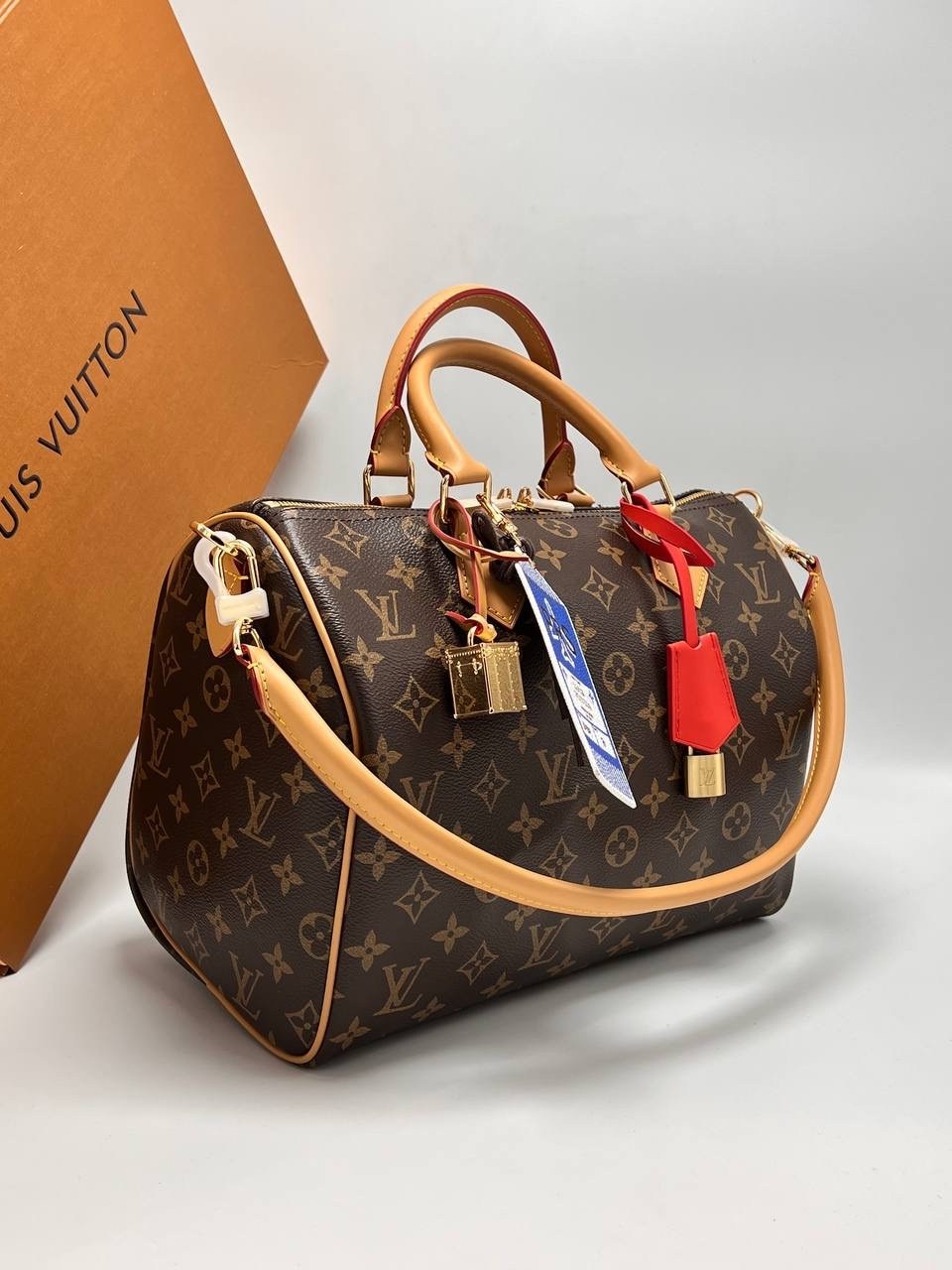сумка женская louis vuitton,классическая сумка speedy louis vuitton с монограммой,сумка louis vuitton,сумка коричневая женская в стиле louis vuitton,louis vuitton модная сумка с замком