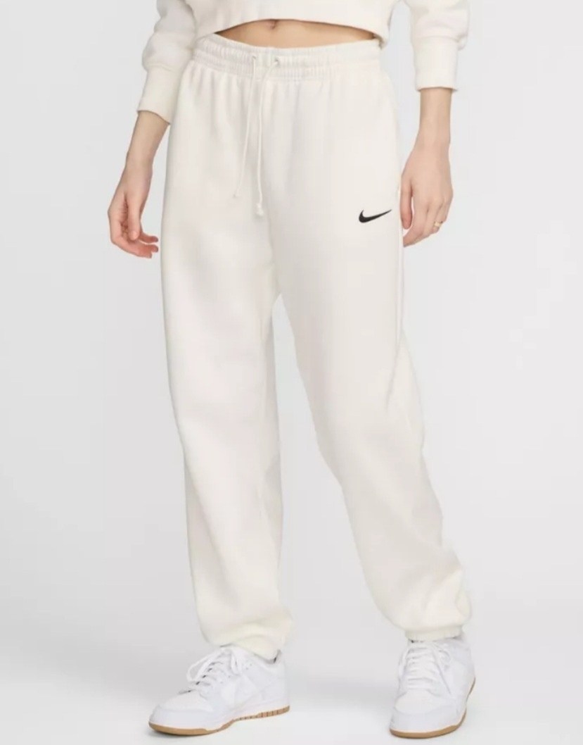 спортивные брюки женские nike ni121a0k2 розовые l,джоггеры найк розовые,женские спортивные штаны nike,штаны спортивные nike dq5887-675 для женщин цвет розовый,спортивные брюки женские nike ni121a0k2 р