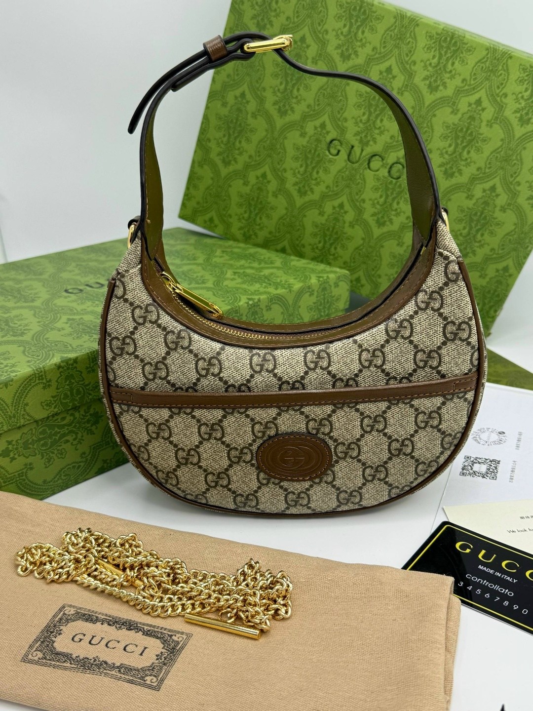 gucci сумка,женская сумка gucci,gucci сумка на плечо полумесяц,сумка гуччи кросс боди,gucci сумка на плечо
