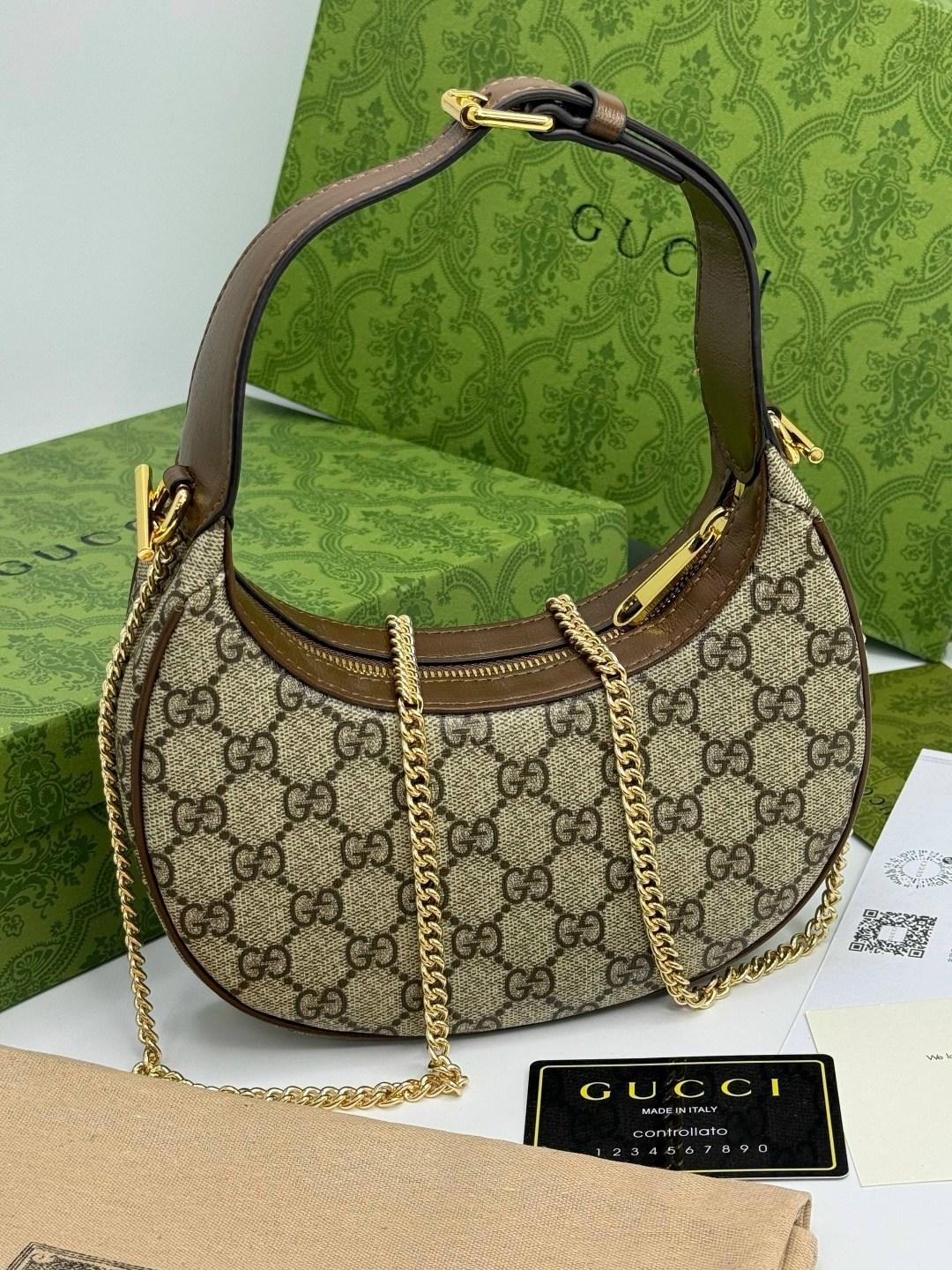 gucci сумка,женская сумка gucci,gucci сумка на плечо полумесяц,сумка гуччи кросс боди,gucci сумка на плечо