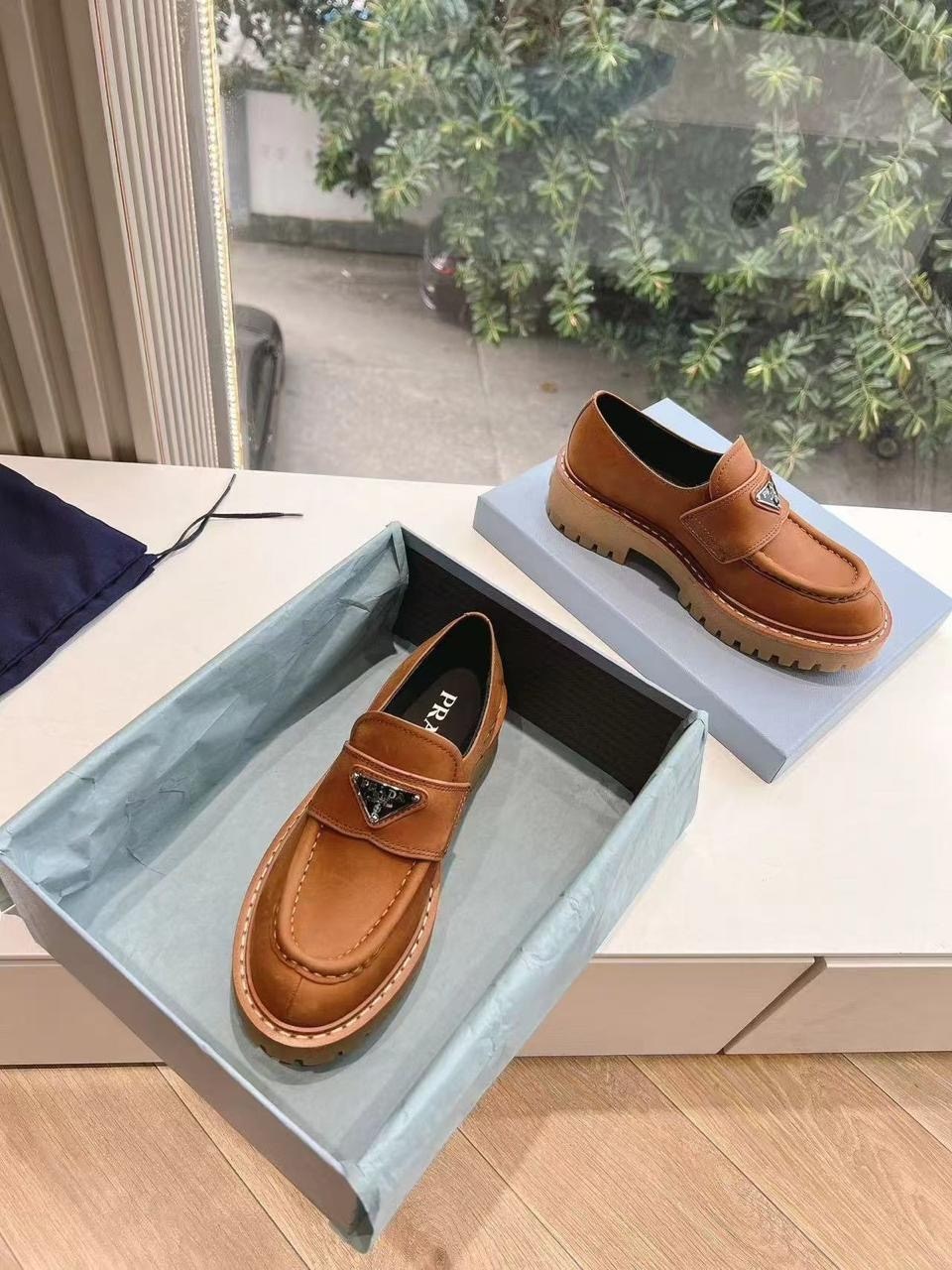 кожаные лоферы prada,лоферы прада,лоферы prada,прада лоферы женские кожаные,