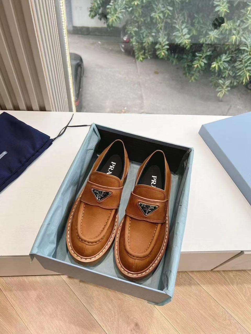 кожаные лоферы prada,лоферы прада,лоферы prada,прада лоферы женские кожаные,