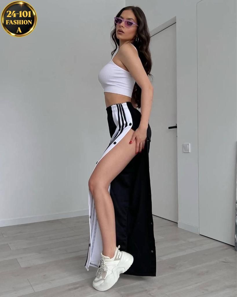 брюки спортивные женская,cпортивные штаны женские,широкие штаны адидас женские с лампасами,штаны на кнопках сбоку широкие с полосками,штаны трикотаж