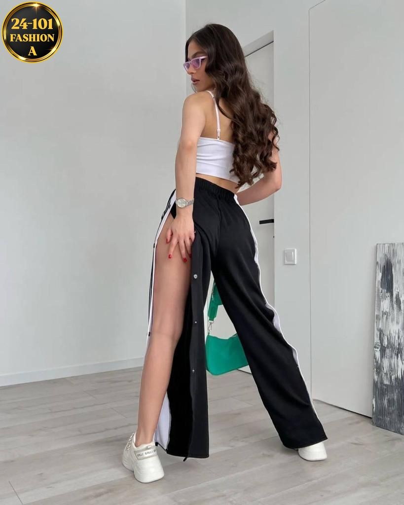 брюки спортивные женская,cпортивные штаны женские,широкие штаны адидас женские с лампасами,штаны на кнопках сбоку широкие с полосками,штаны трикотаж