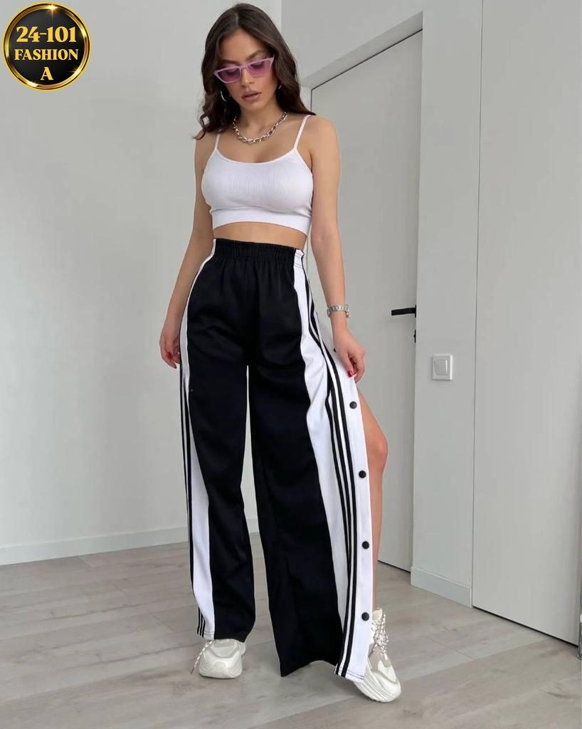 брюки спортивные женская,cпортивные штаны женские,широкие штаны адидас женские с лампасами,штаны на кнопках сбоку широкие с полосками,штаны трикотаж