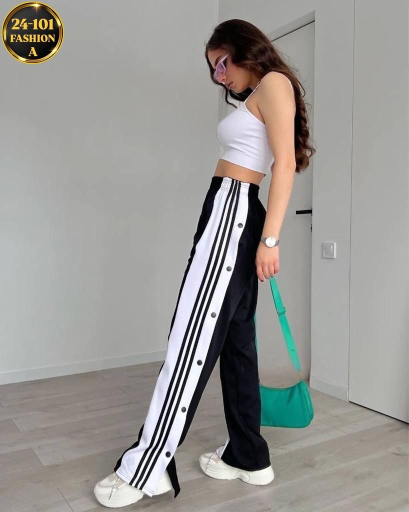 брюки спортивные женская,cпортивные штаны женские,широкие штаны адидас женские с лампасами,штаны на кнопках сбоку широкие с полосками,штаны трикотаж