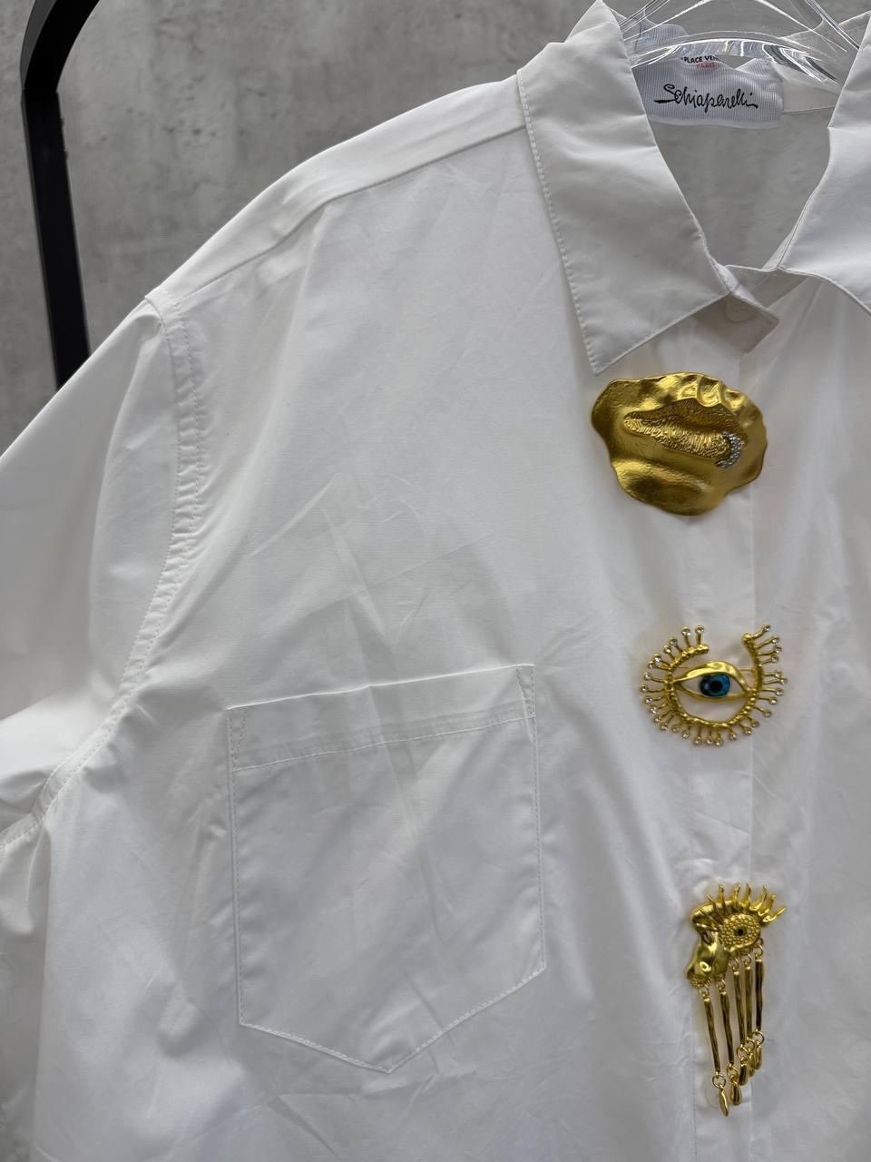 рубашка женская,женская рубашка белая,рубашка модная,женская однобортная рубашка однотонная асимметричная с декоративными пуговицами и откидным воротником,рубашка повседневная