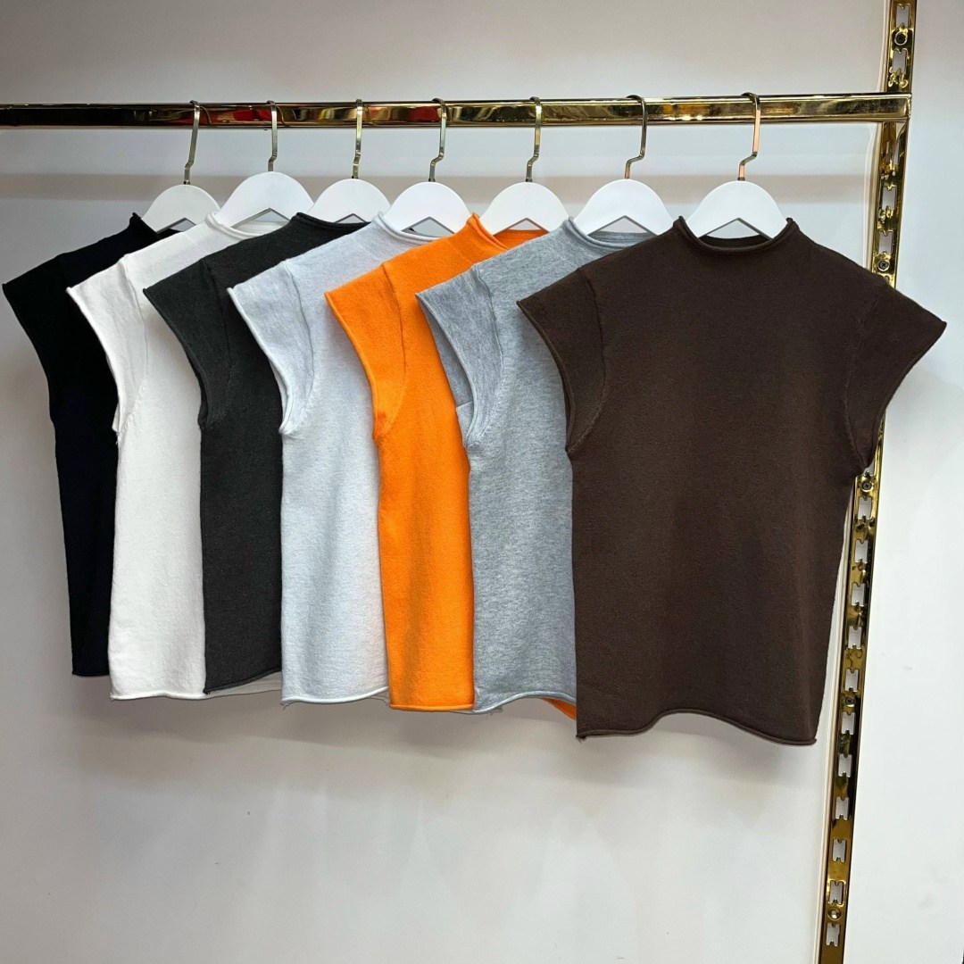 трикотажный свитер,трикотажный жилет,модные свитера,свитер без рукавов,вязаные жилеты