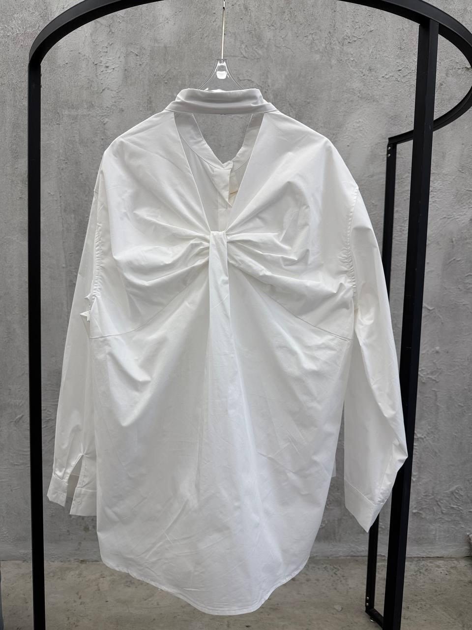 рубашка женская,женская рубашка белая,рубашка модная,женская однобортная рубашка однотонная асимметричная с декоративными пуговицами и откидным воротником,рубашка повседневная