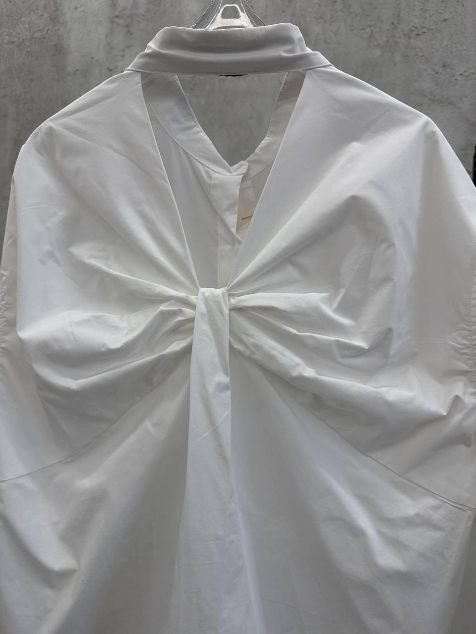 рубашка женская,женская рубашка белая,рубашка модная,женская однобортная рубашка однотонная асимметричная с декоративными пуговицами и откидным воротником,рубашка повседневная