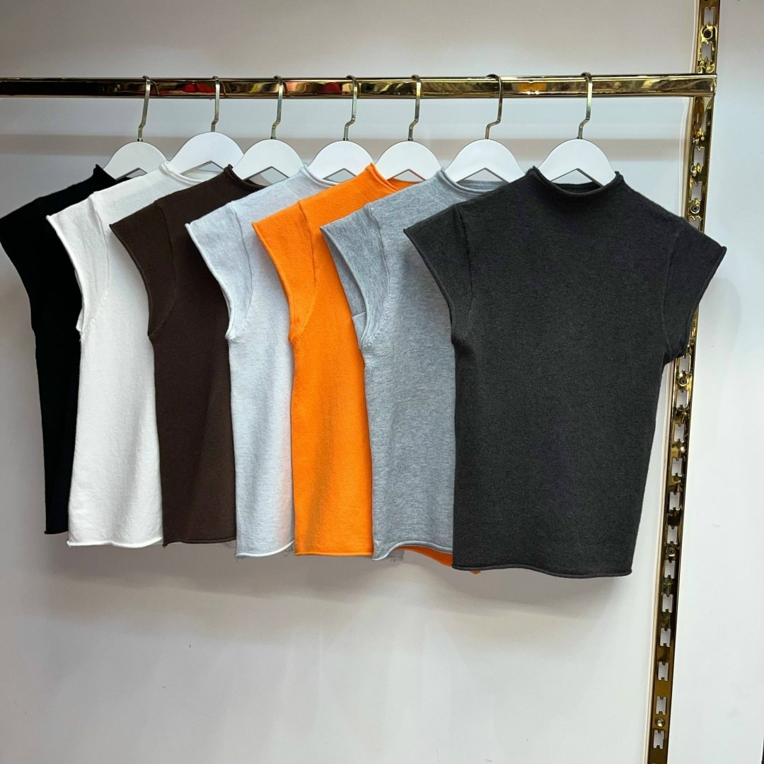 трикотажный свитер,трикотажный жилет,модные свитера,свитер без рукавов,вязаные жилеты