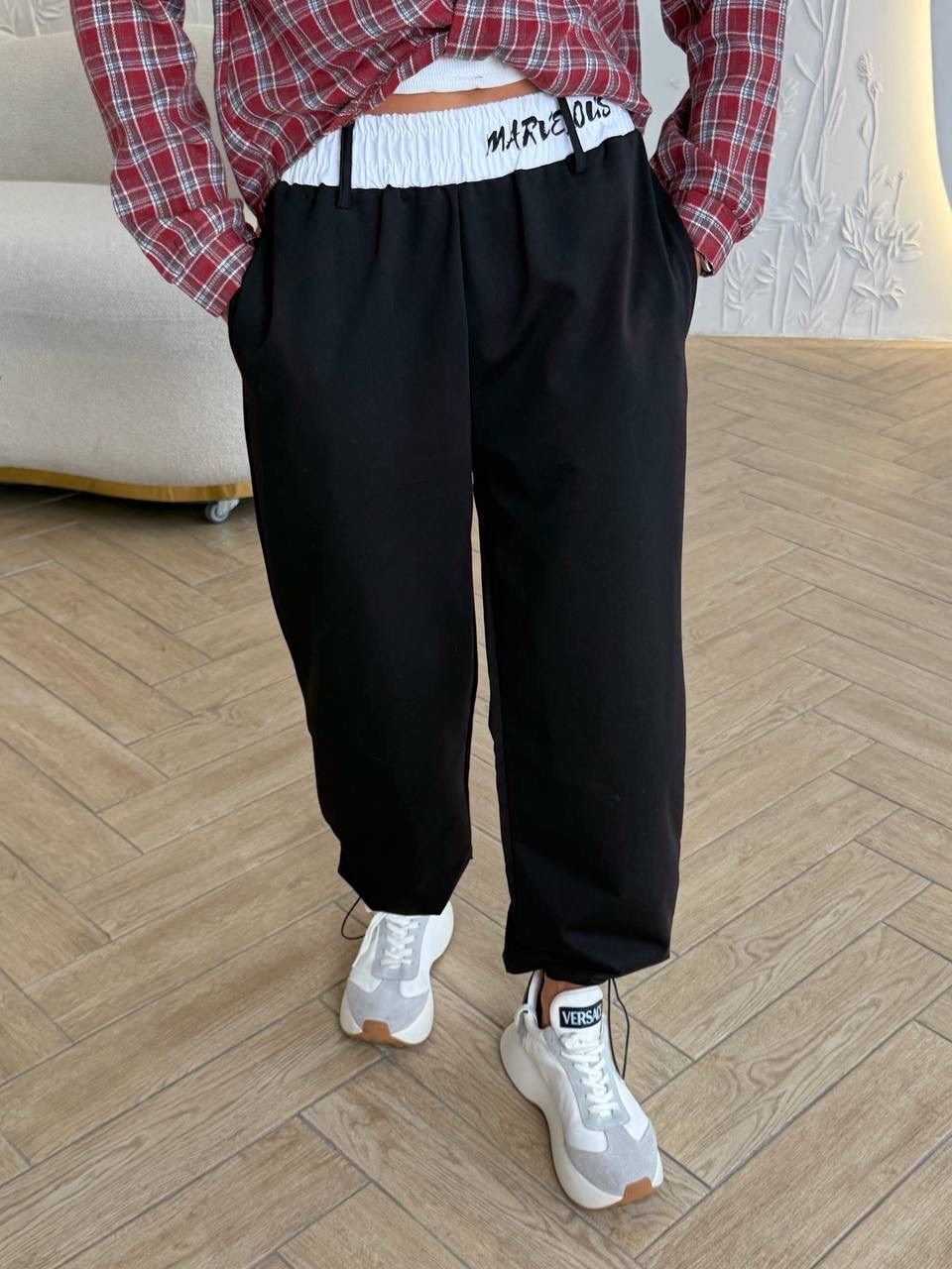 трикотажные брюки,спортивные трикотажные брюки,брюки в спортивном стиле,брюки спортивные,одежда брюки