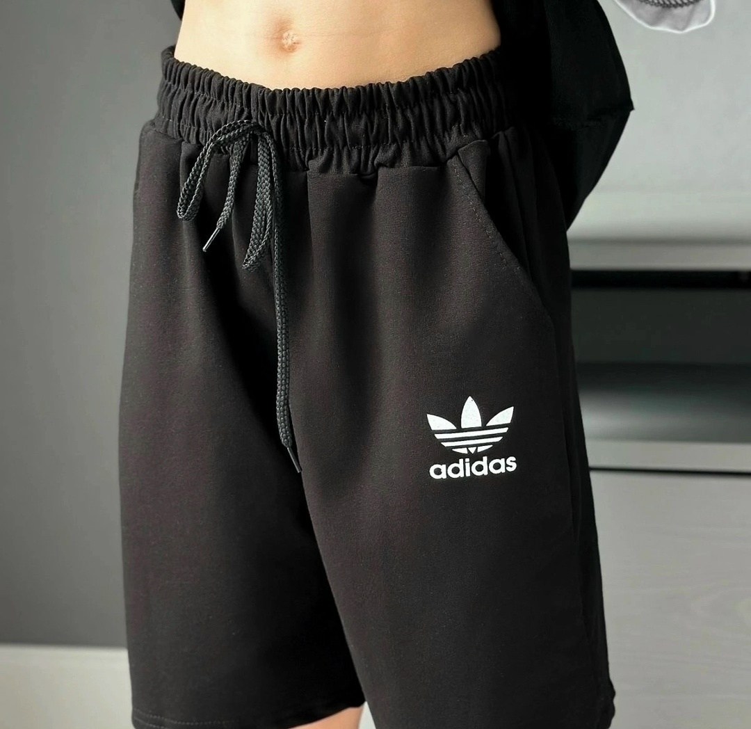 спортивные трикотажные шорты,женские спортивные шорты nike,шорты женские nike,юбка-шорты спортивные nike,шорты женские широкие